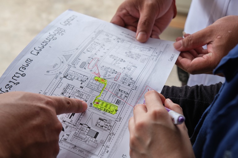 man checking the oxygen tanks